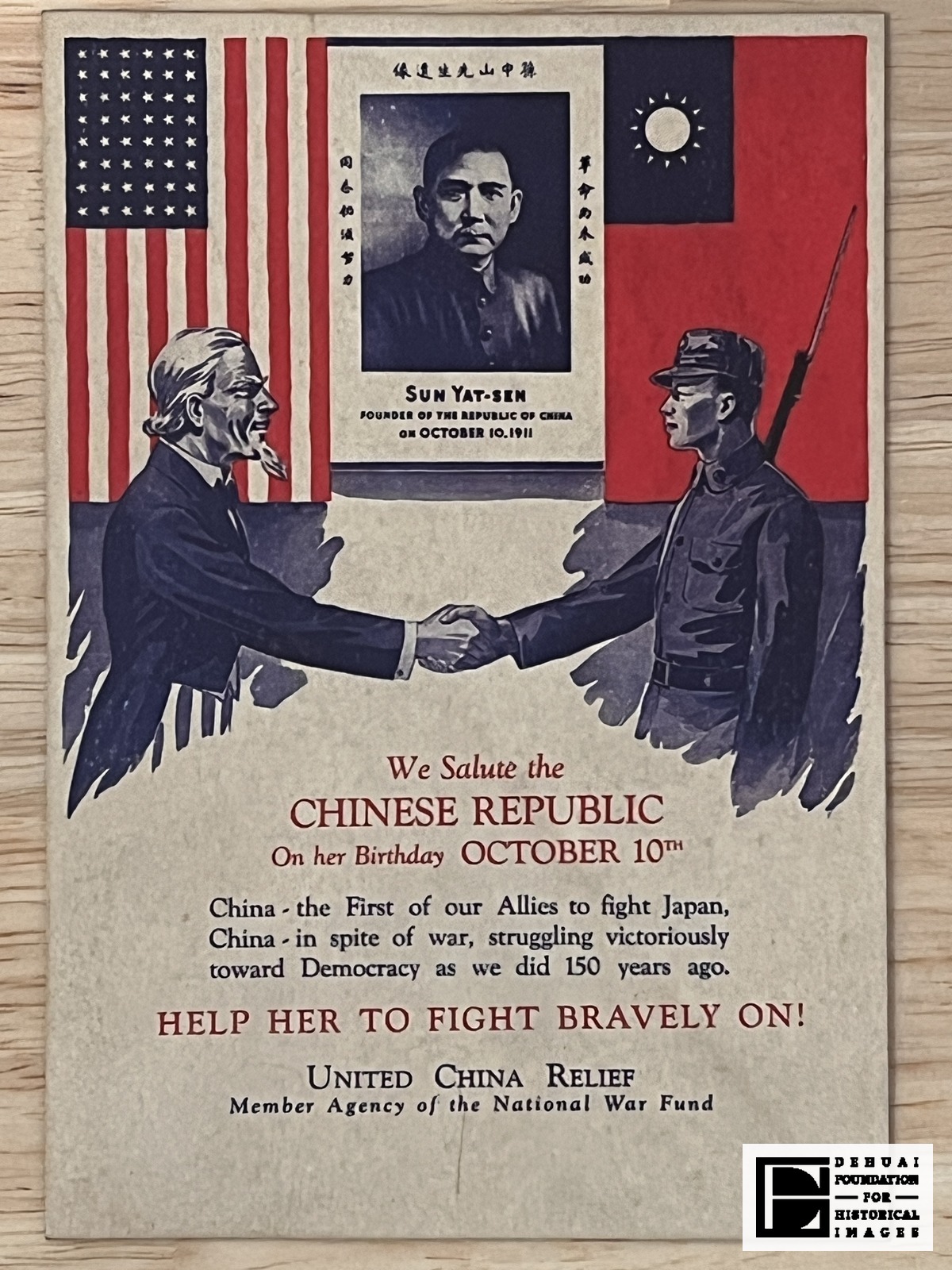 TFA-CA-131 — Face of the sheet: the portrait of Sun Yat-sen between the United States and Republic of China flags, above the handshake and the Double Ten appeal.